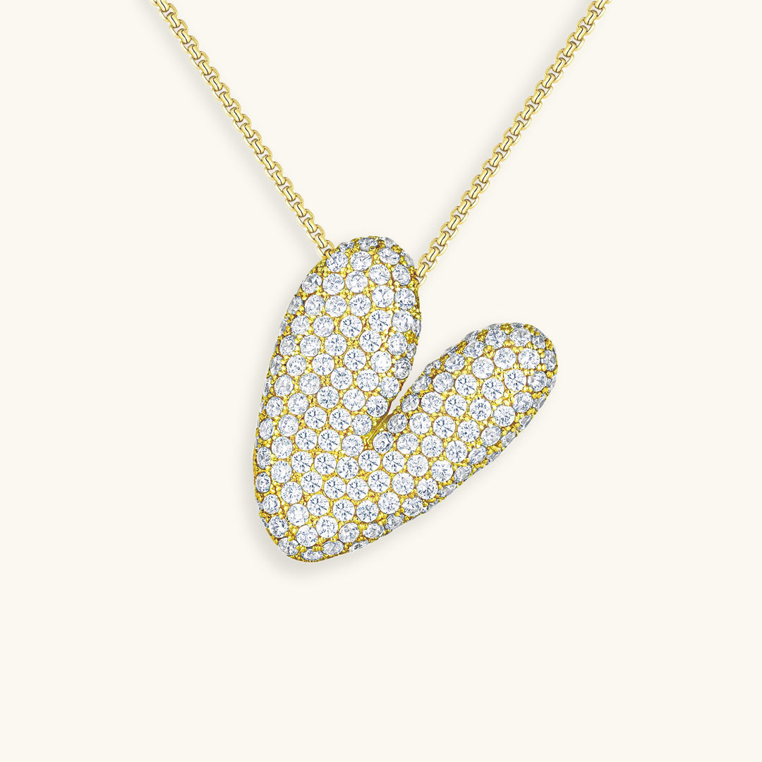 Melanie – Doble corazón en collar dorado
