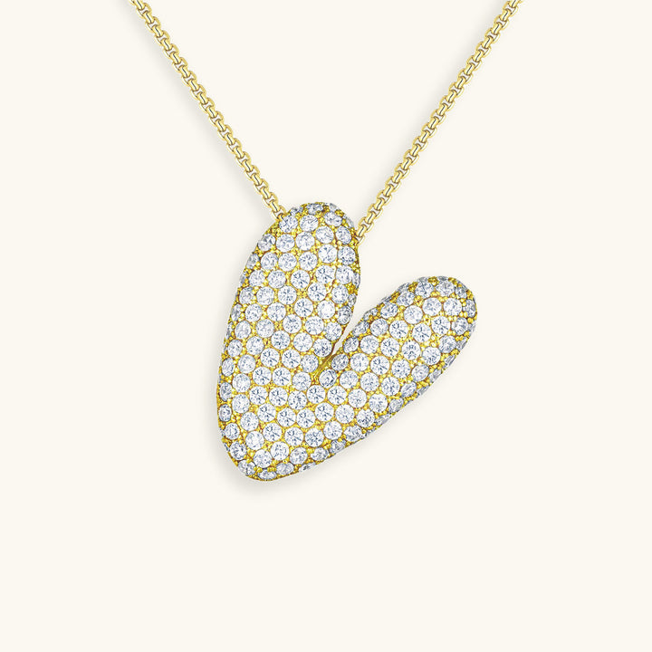 Melanie – Doble corazón en collar dorado