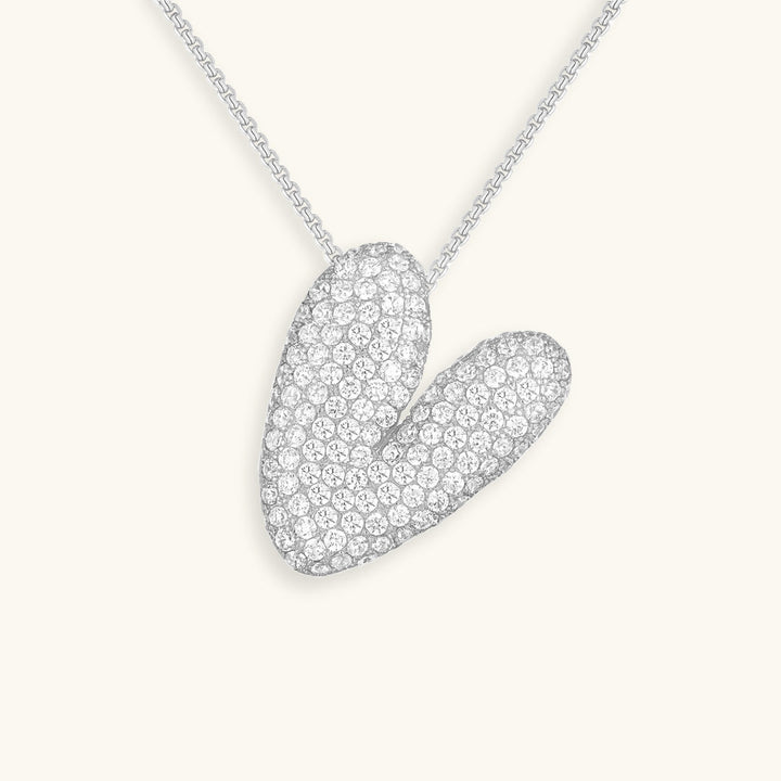 Melanie – Doble corazón en collar dorado
