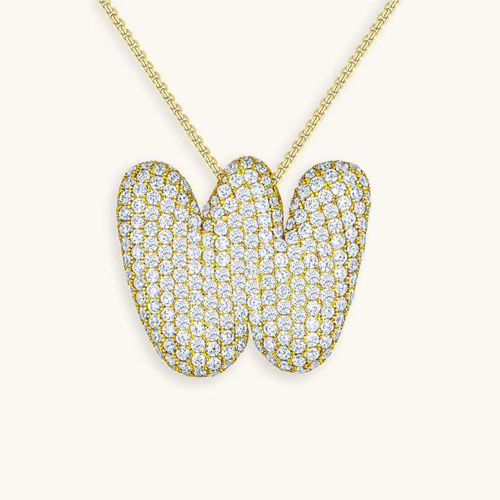 Melanie – Doble corazón en collar dorado