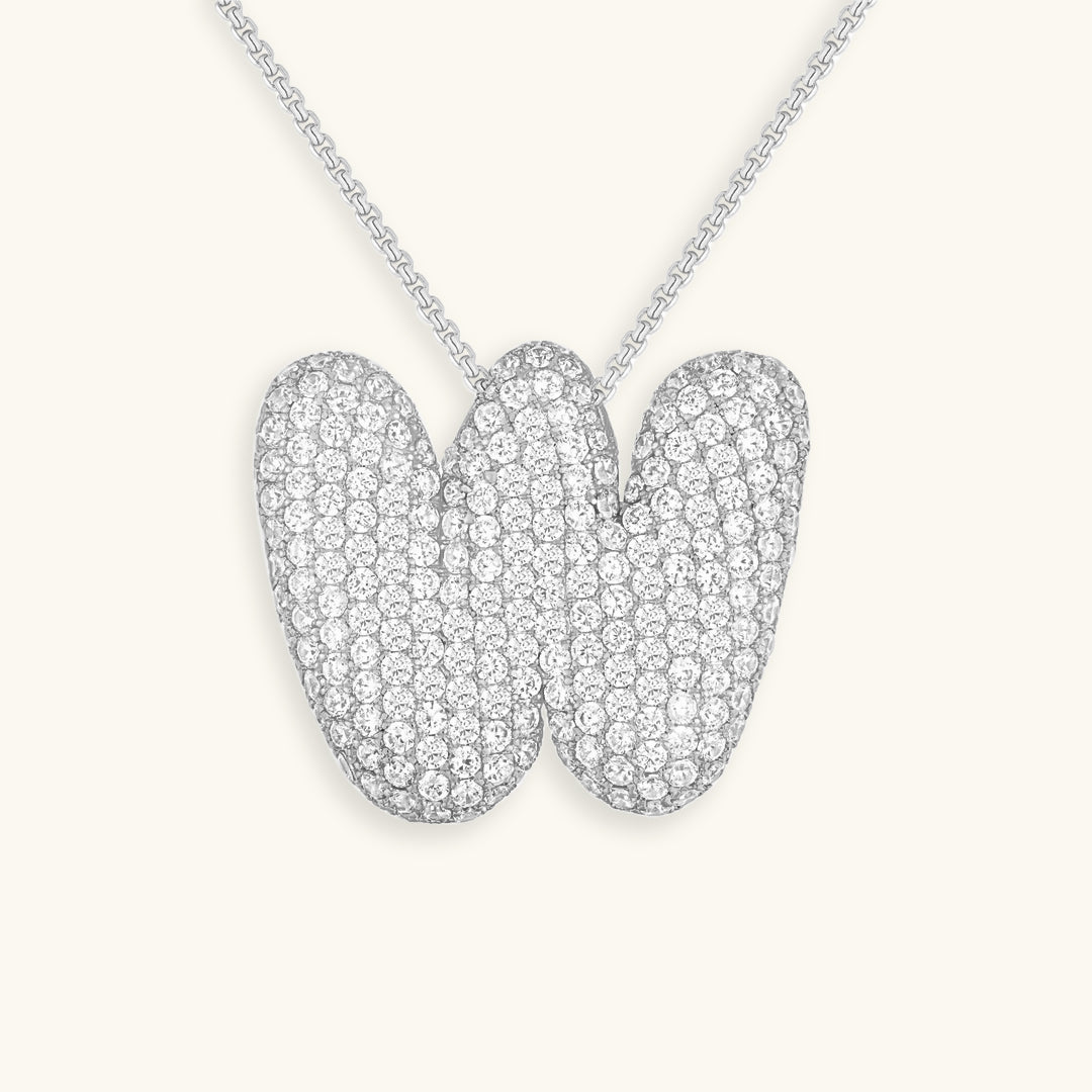Melanie – Doble corazón en collar dorado