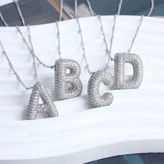 Collar con colgantes de letras - Raúl & Sara Madrid