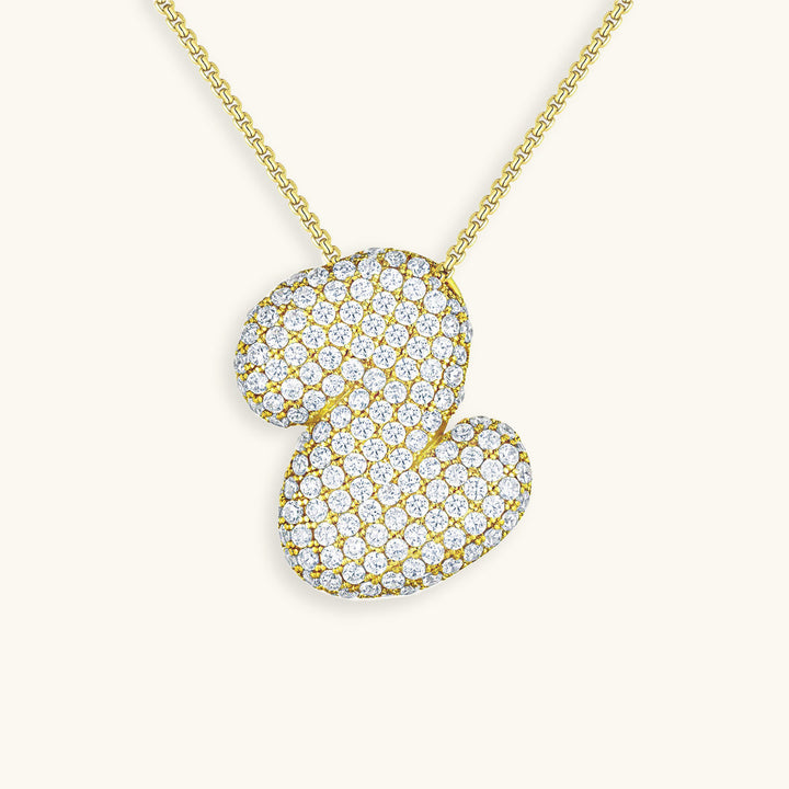 Melanie – Doble corazón en collar dorado