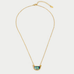 Collar dorado con colgante de cristal - Raúl & Sara Madrid