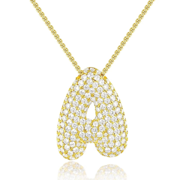 Melanie – Doble corazón en collar dorado