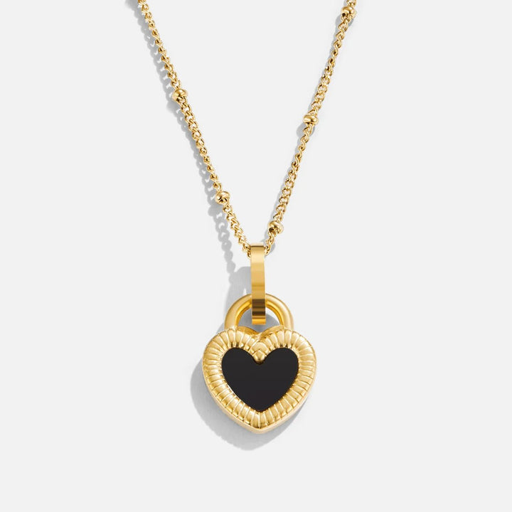 Monika – Péndulo en elegante gota de oro cálido.