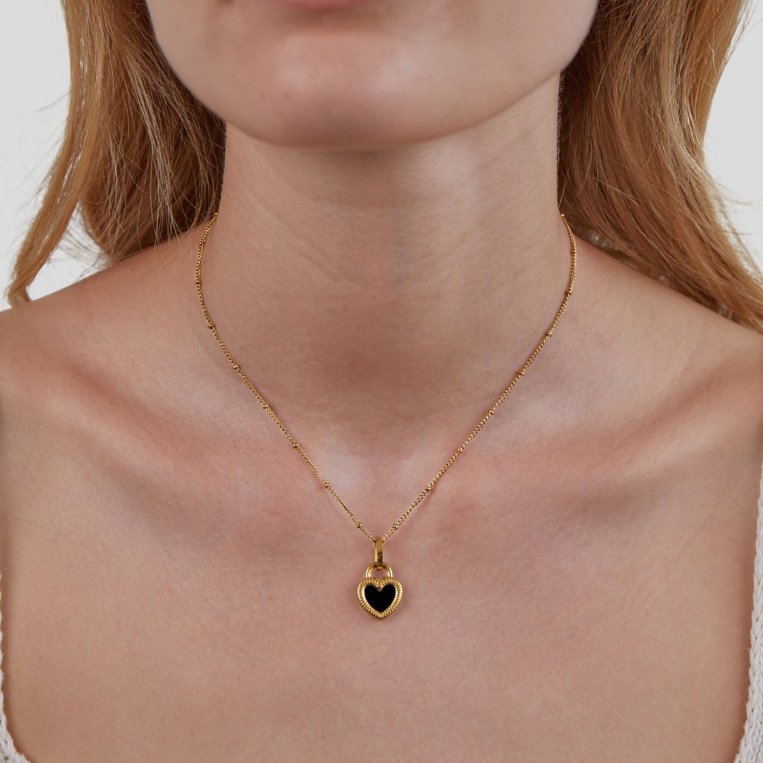 Monika – Péndulo de gota en tono dorado