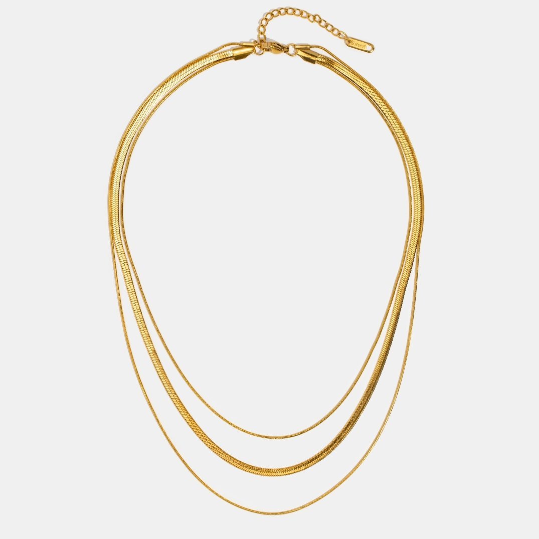 Collar dorado con elegante piedra - Raúl & Sara Madrid