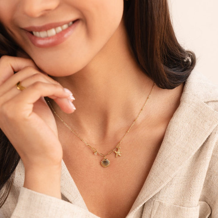 Greta – Cadena con colgante de estrella en tono dorado