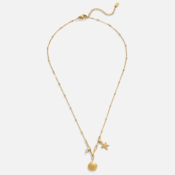 Greta – Cadena con colgante de estrella en tono dorado.