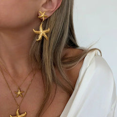 Collar dorado con colgante en forma de estrella - Raúl & Sara Madrid