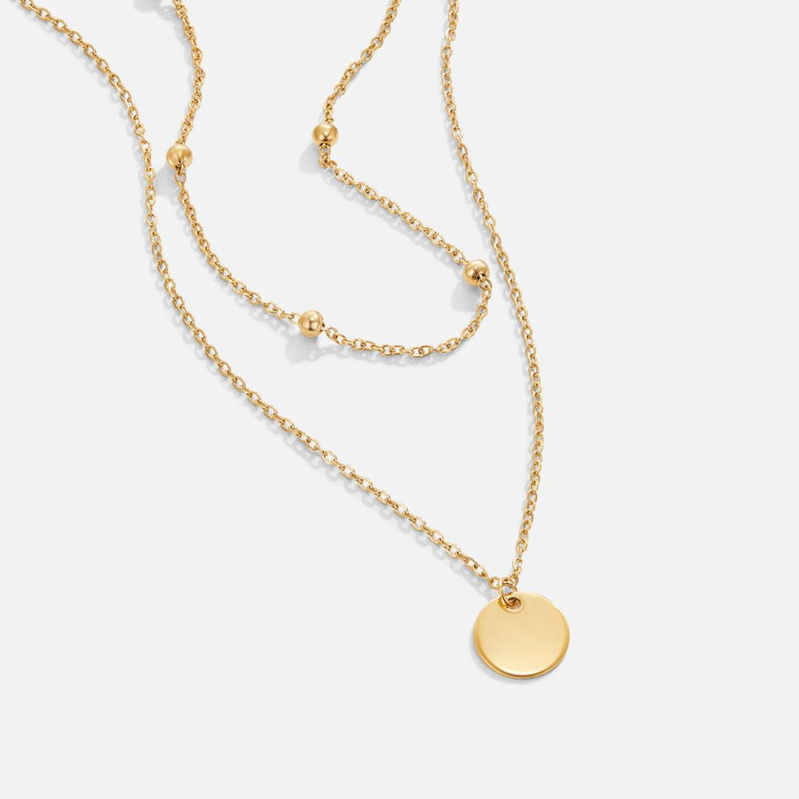 Doble cadena de oro con charm. - Raúl & Sara Madrid