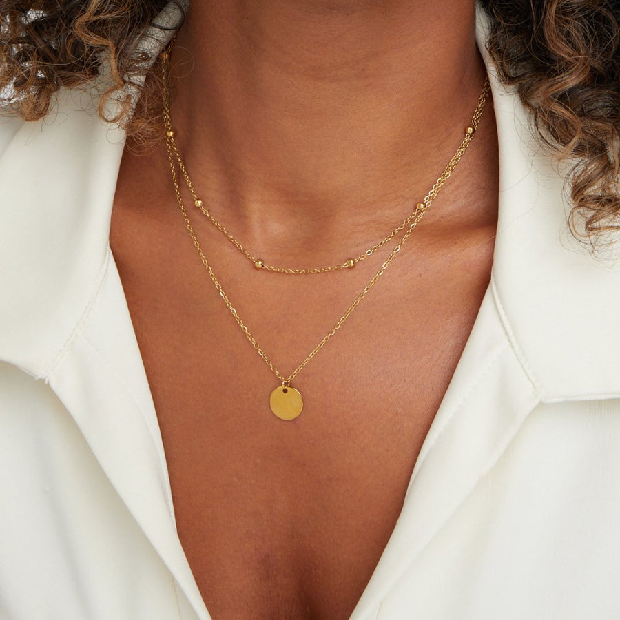 Doble cadena de oro con charm. - Raúl & Sara Madrid