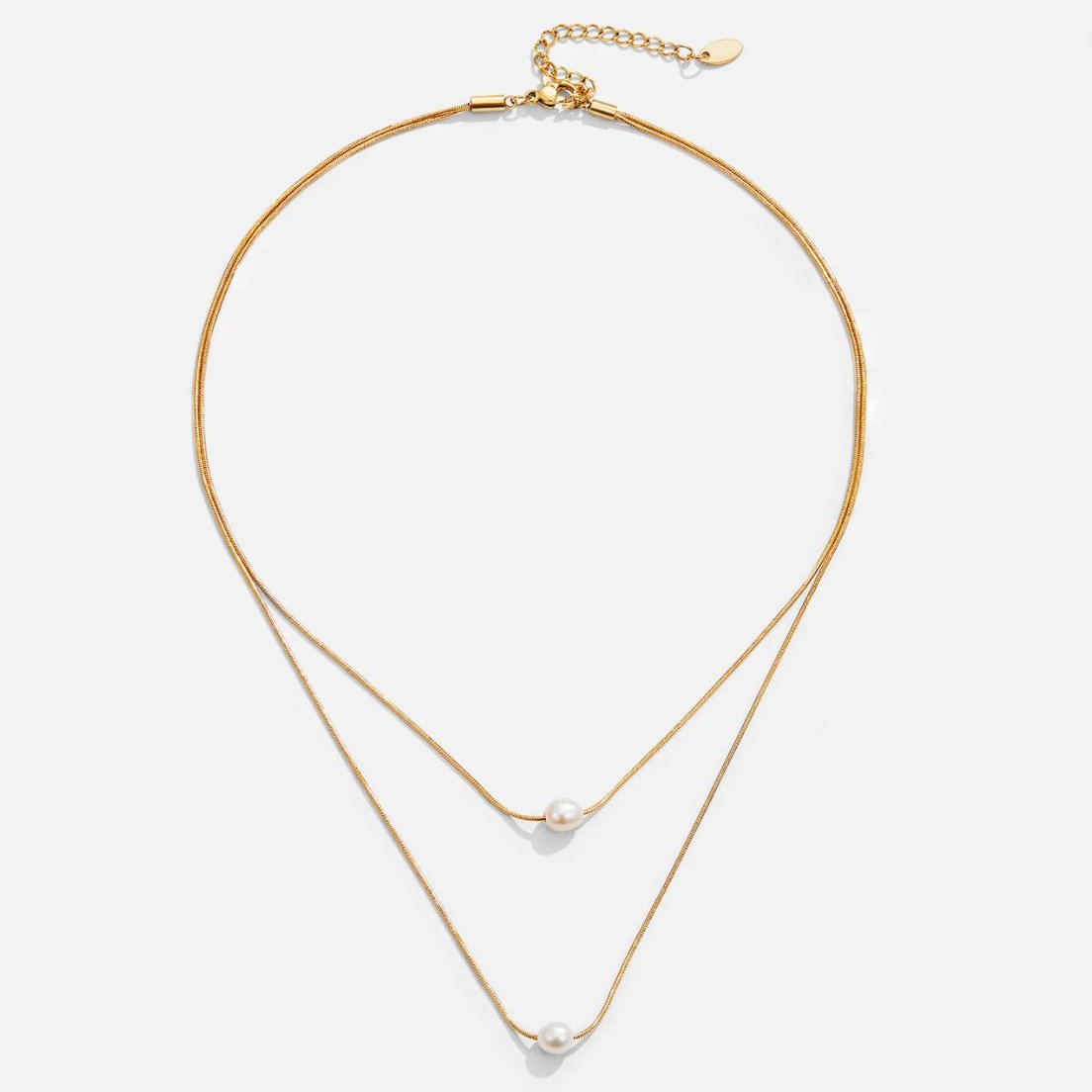 Doble capa de collar dorado con piedra oscura - Raúl & Sara Madrid