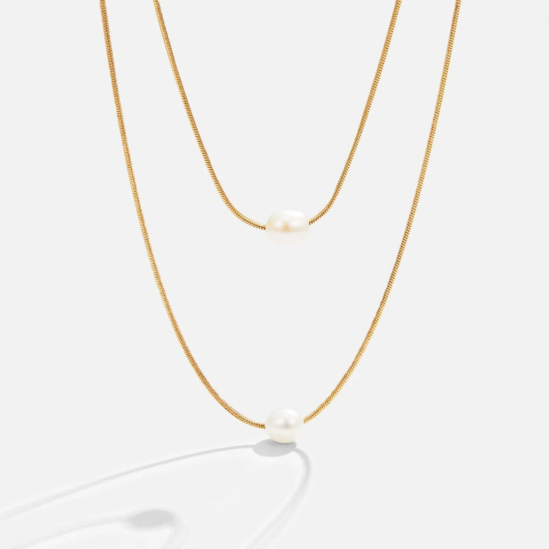 Nora – Collana dorata con design a catena