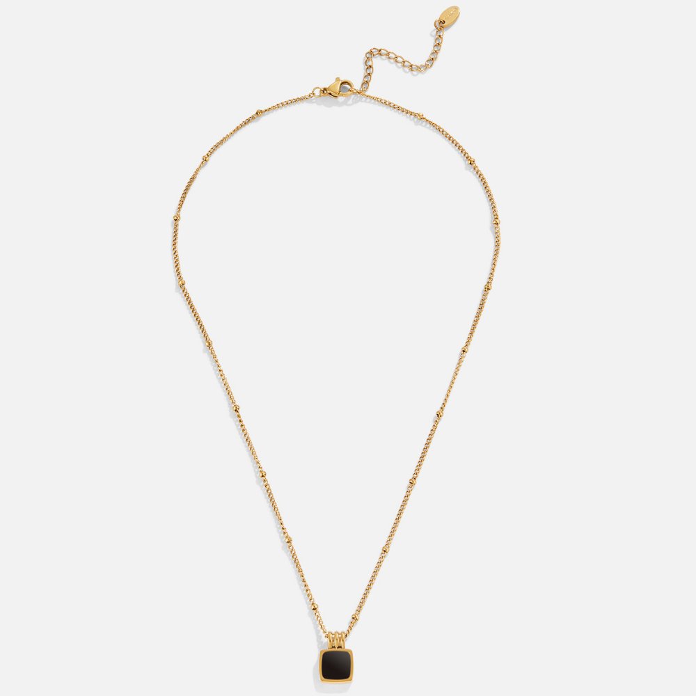 Selina – Collar dorado con gema oscura