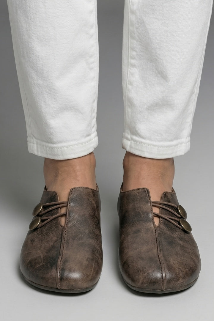 Mocasines planos con botones