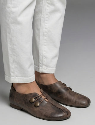 Mocasines planos con botones
