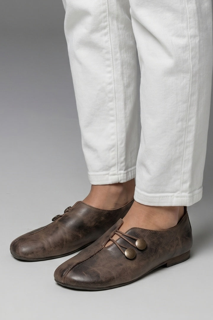 Mocasines planos con botones
