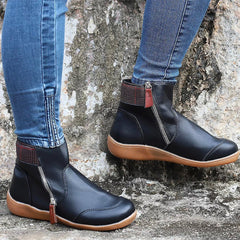 Botines planos con cremallera