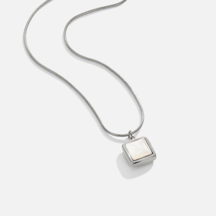 Silvie – Collana dorata con piccole placchette