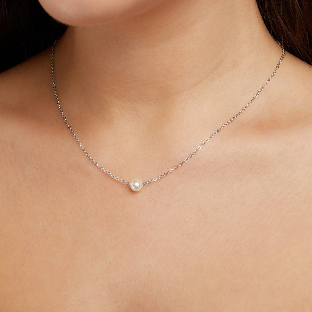 Clara – Collana dorata con pendente circolare