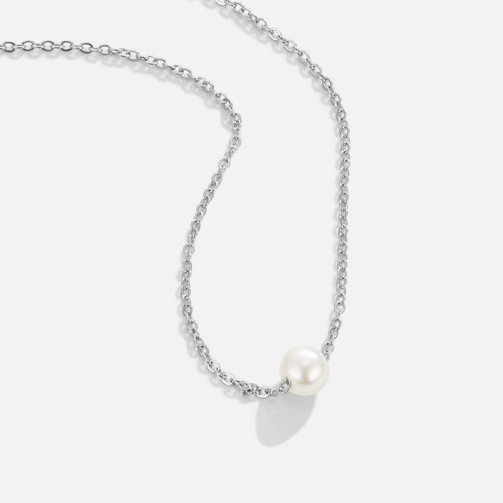 Clara – Collana dorata con pendente circolare