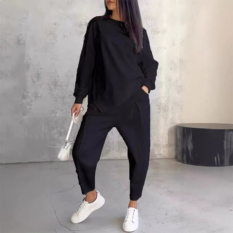 Conjunto de dos piezas para mujer: sudadera de manga larga con bajo asimétrico y pantalón - Raúl & Sara Madrid