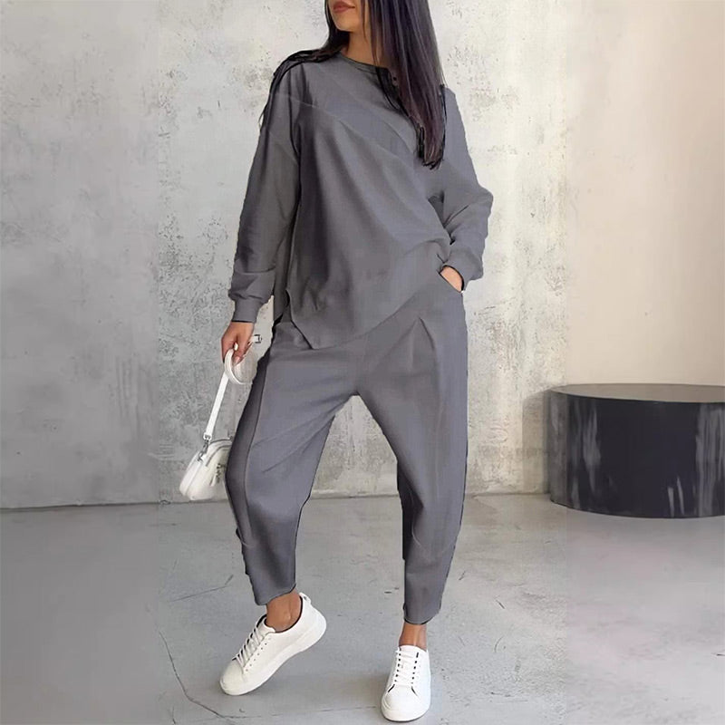 Conjunto de dos piezas para mujer: sudadera de manga larga con bajo asimétrico y pantalón - Raúl & Sara Madrid