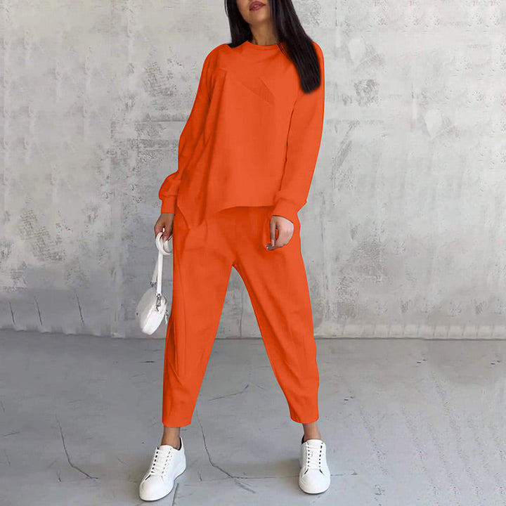 Conjunto de dos piezas para mujer: sudadera de manga larga con bajo asimétrico y pantalón.