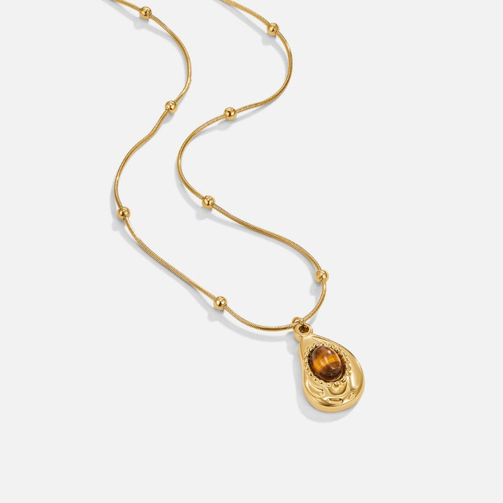 Rosa – Collana dorata con delicate perle
