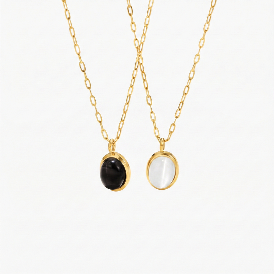 Doble collar dorado con acentos negros. - Raúl & Sara Madrid