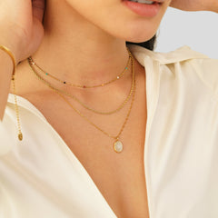 Doble collar dorado con acentos negros. - Raúl & Sara Madrid